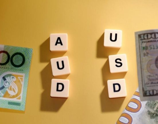 AUDUSD Breaks Symmetrical Triangle Pattern Amidst Selling Pressure: Governor Lowe's Comments Provide Limited Support
